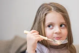 Young girl swallowing therapy